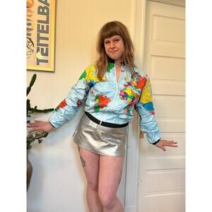 Y2K does 1960s vintage silver Courreges mini skirt space age zipper m metallic